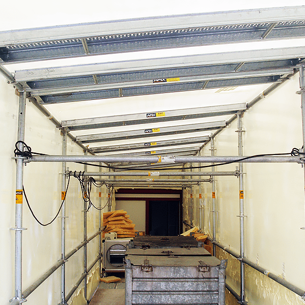 Afixfast X52 shrinkwrap scaffold with roof construction